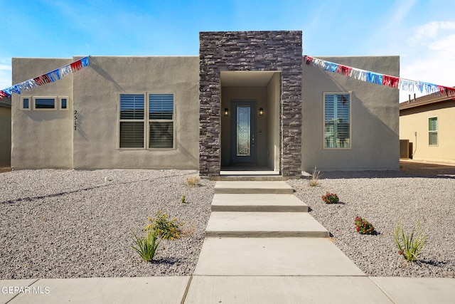 view of front of home featuring central AC