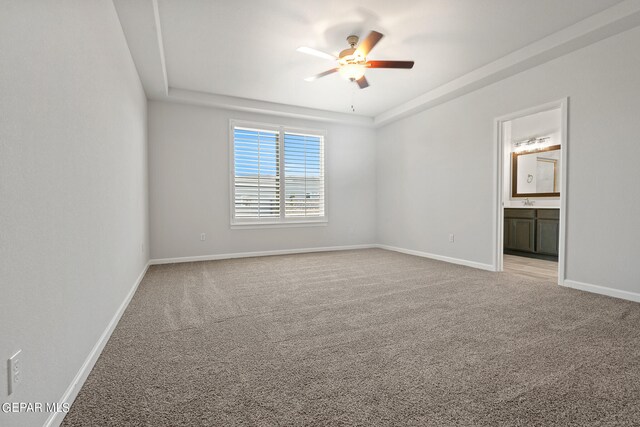 2517 Tony Harper St, El Paso, TX 79938 - carpeted spare room with a raised ceiling and ceiling fan