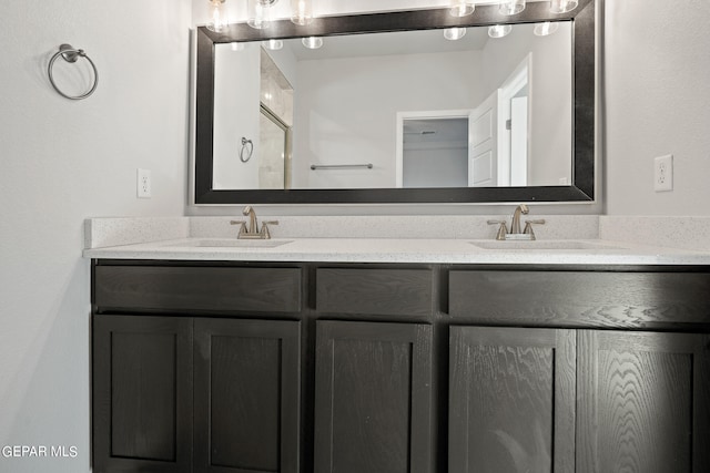 2517 Tony Harper St, El Paso, TX 79938 - bathroom featuring dual sinks and vanity with extensive cabinet space