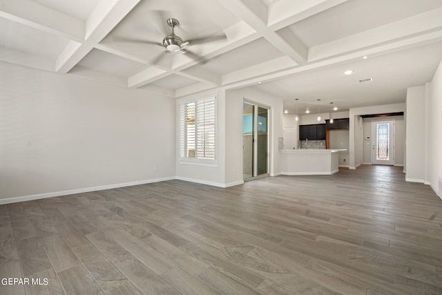 2517 Tony Harper St, El Paso, TX 79938 - unfurnished living room with coffered ceiling, dark wood-type flooring, and a wealth of natural light