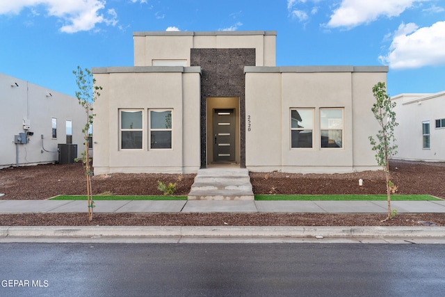 view of front facade with central air condition unit