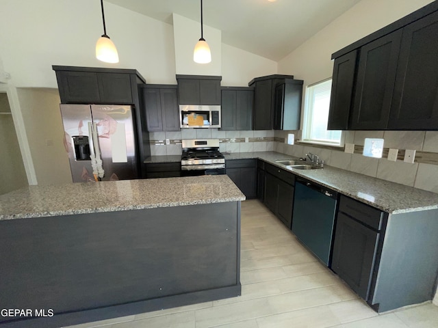 kitchen featuring stainless steel appliances, light stone countertops, vaulted ceiling, tasteful backsplash, and sink