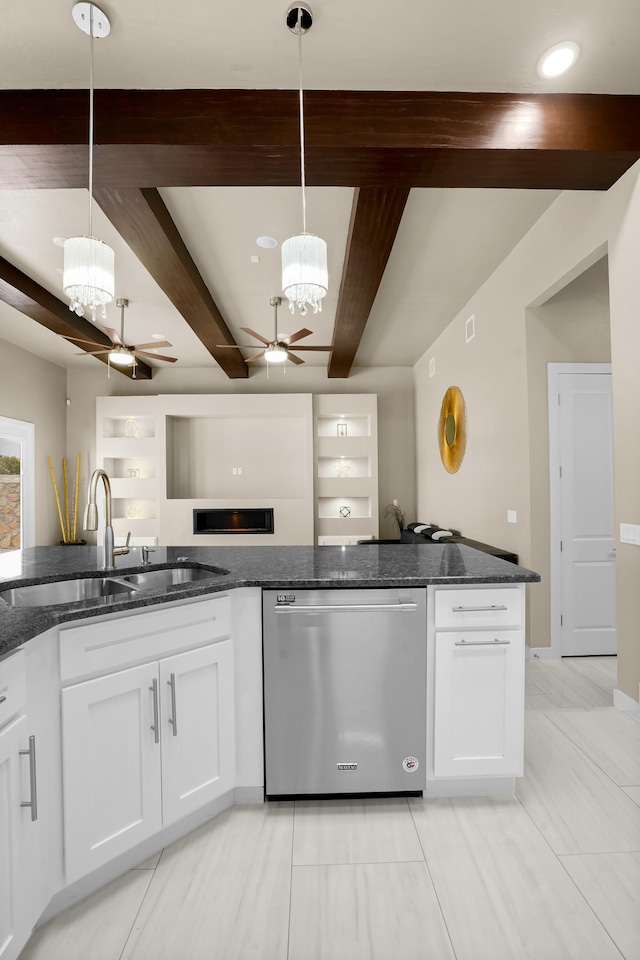 kitchen with hanging light fixtures, ceiling fan with notable chandelier, beamed ceiling, sink, and dishwasher