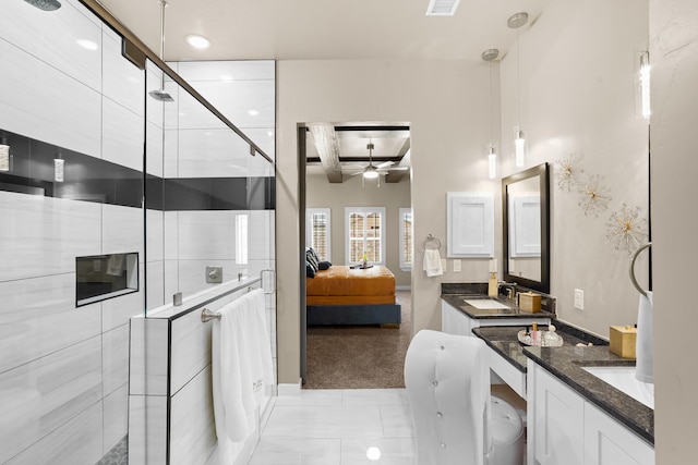 bathroom featuring beam ceiling, double sink vanity, a shower with door, ceiling fan, and tile floors