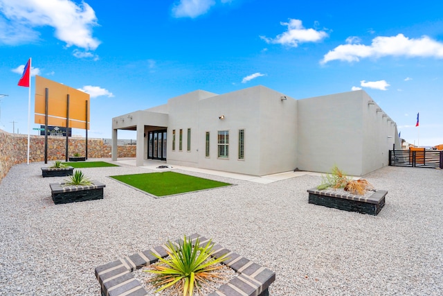 rear view of house with a patio