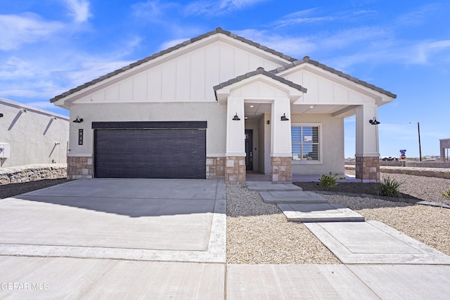 view of front of home with a garage