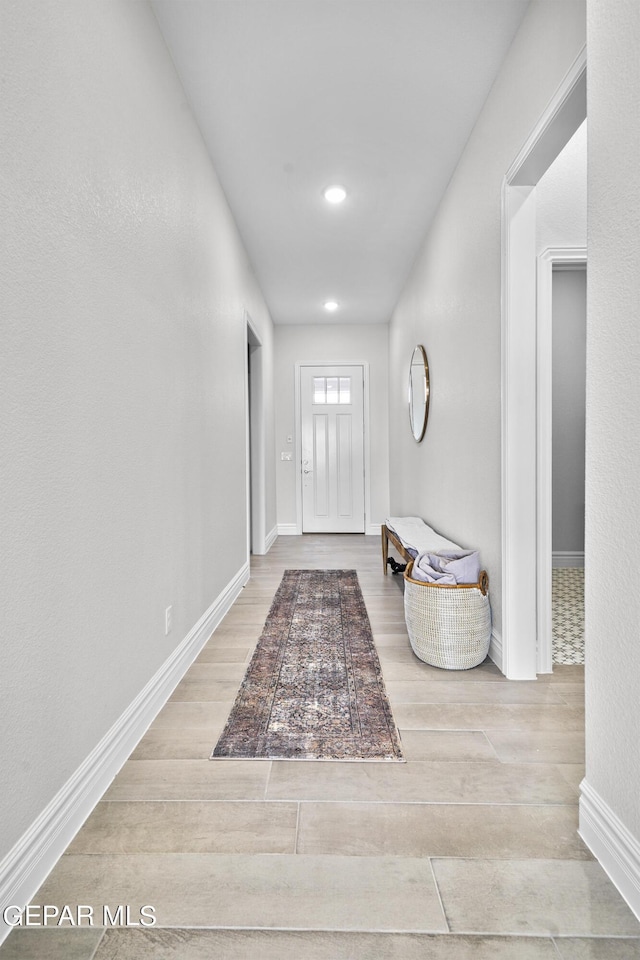 foyer with light hardwood / wood-style flooring