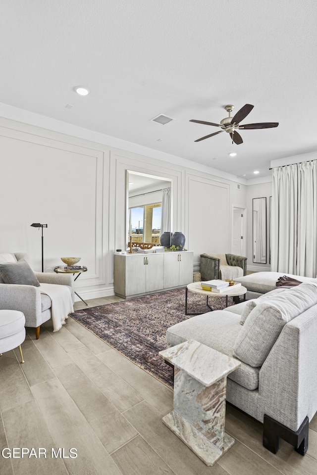 living room featuring ceiling fan