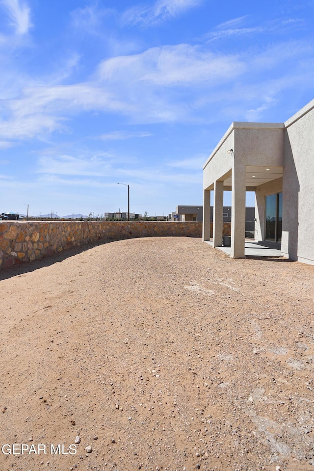 view of yard featuring a patio