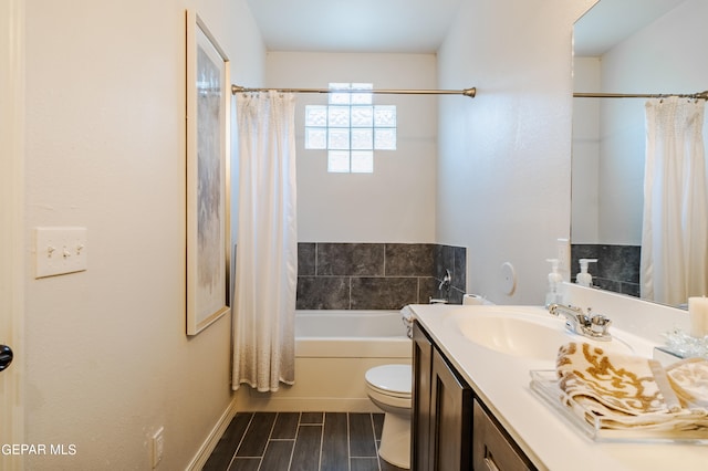 full bathroom with shower / bathtub combination with curtain, toilet, and vanity