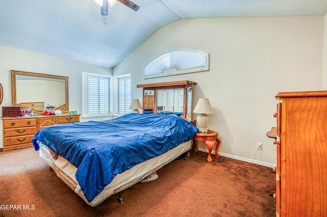 bedroom with lofted ceiling, baseboards, a textured ceiling, carpet floors, and ceiling fan