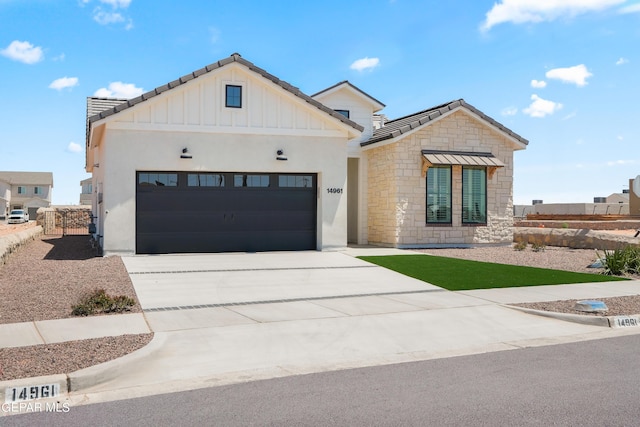 modern farmhouse with a garage