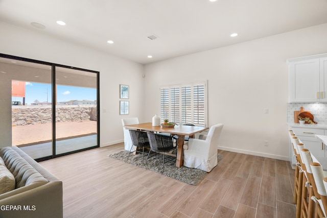 dining area featuring light hardwood / wood-style floors