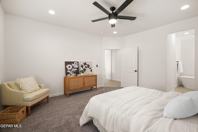 carpeted bedroom featuring ensuite bathroom and ceiling fan