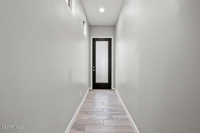 corridor featuring light wood-type flooring