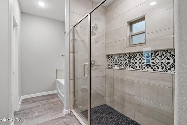 bathroom with independent shower and bath