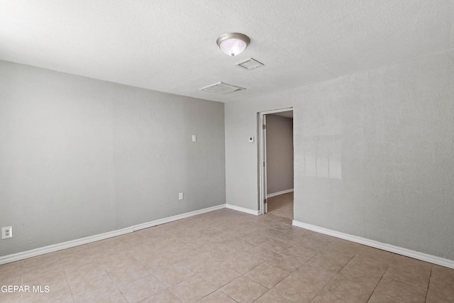 view of tiled spare room