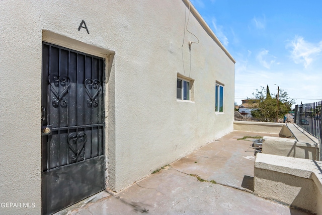 view of home's exterior with a patio