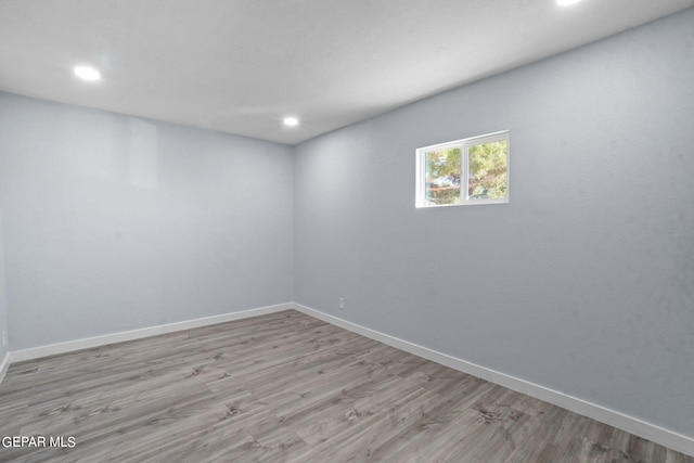 unfurnished room featuring light wood-type flooring