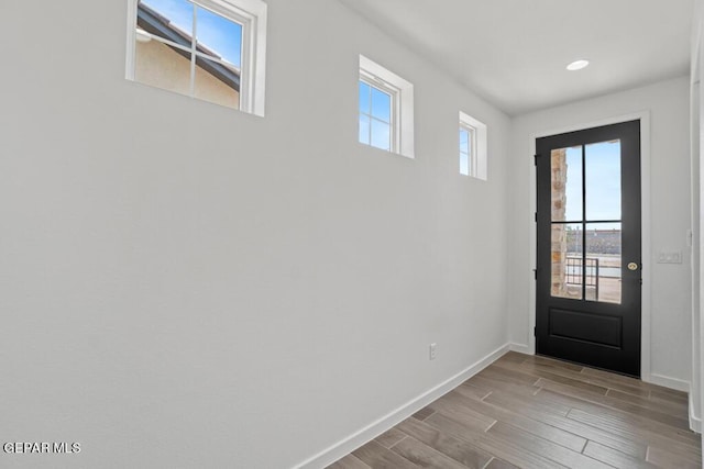 entryway with light hardwood / wood-style floors