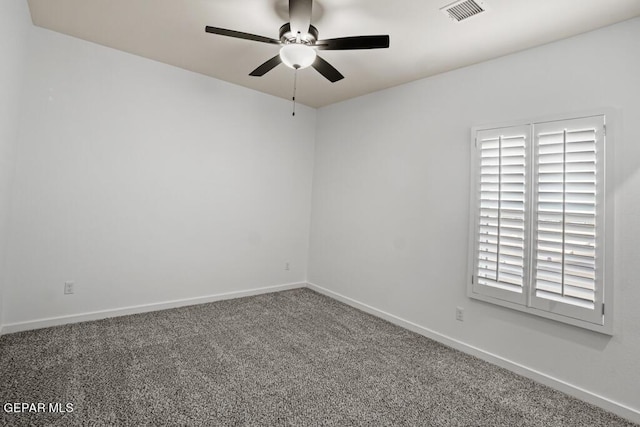 empty room with carpet flooring and ceiling fan