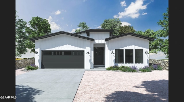 view of front of house with a garage and driveway