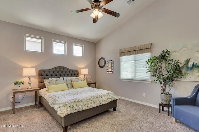 bedroom featuring ceiling fan, lofted ceiling, and light carpet