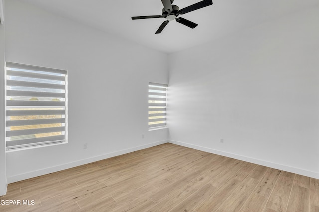 469 Country Oaks Dr, El Paso, TX 79932 - unfurnished room featuring ceiling fan, light wood-type flooring, and a healthy amount of sunlight