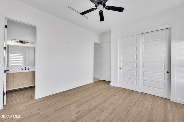 469 Country Oaks Dr, El Paso, TX 79932 - unfurnished bedroom featuring ceiling fan, light hardwood / wood-style flooring, and a closet