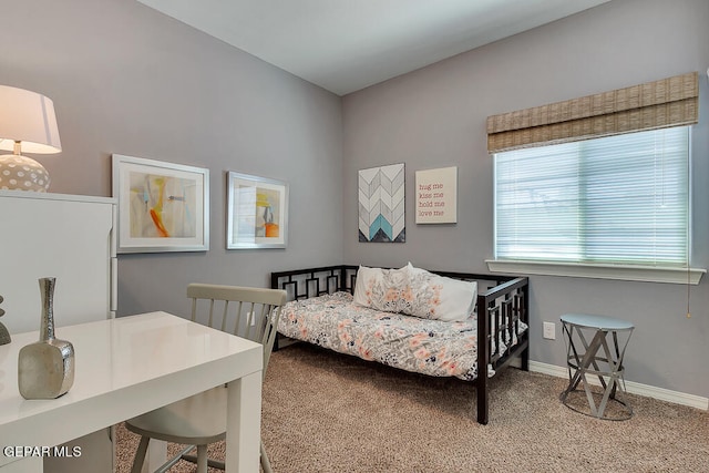 bedroom with light carpet