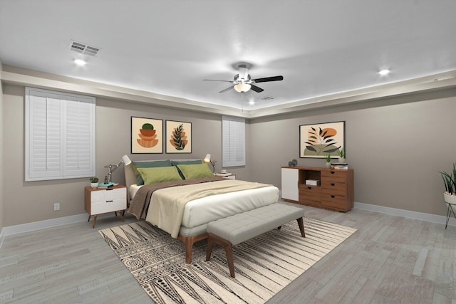 bedroom featuring ceiling fan and light hardwood / wood-style flooring