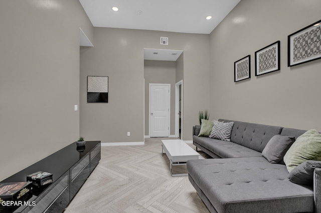 living room featuring light parquet floors