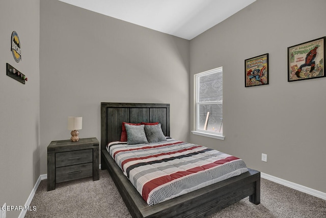 bedroom featuring light colored carpet