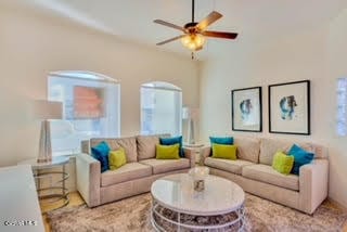 living room with ceiling fan