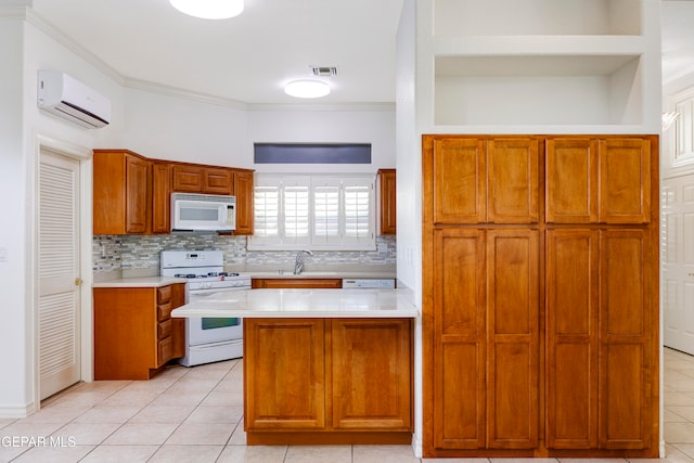 kitchen with light tile patterned floors, white appliances, a wall mounted AC, and sink