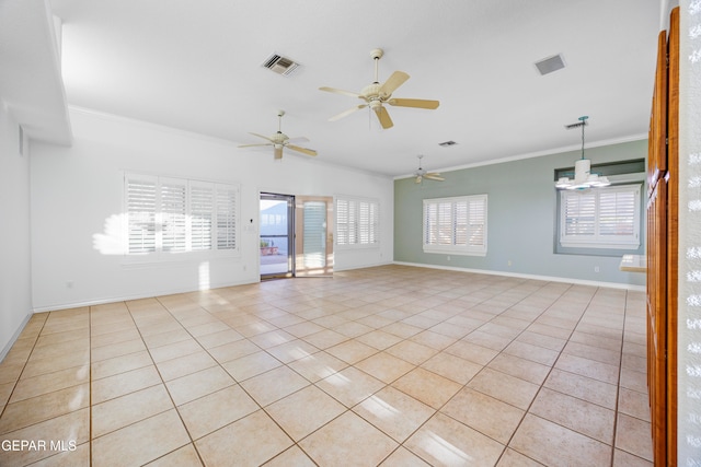 unfurnished room with a wealth of natural light, crown molding, light tile patterned flooring, and ceiling fan with notable chandelier