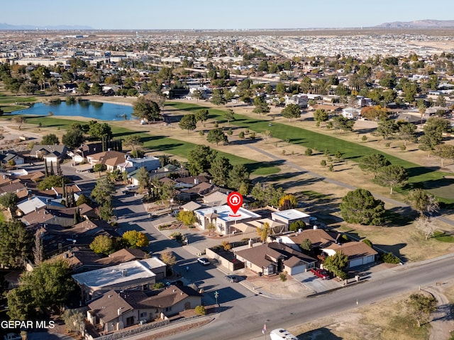 bird's eye view with a water view