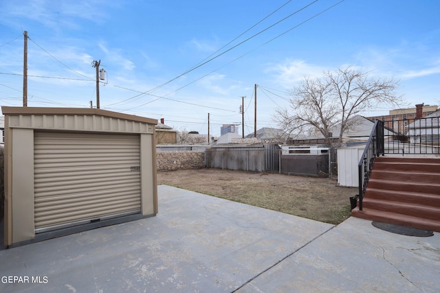 exterior space with an outdoor structure and a garage