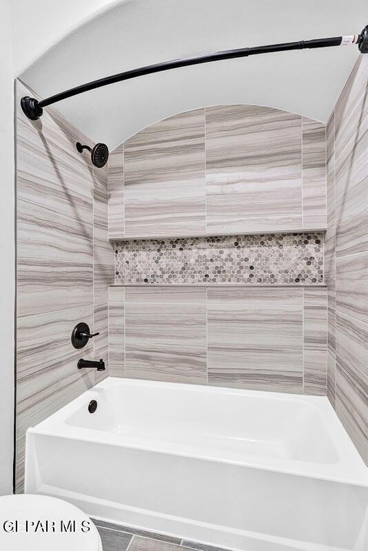 13357 Highworth Dr, El Paso, TX 79928 - bathroom featuring tile patterned floors and tiled shower / bath