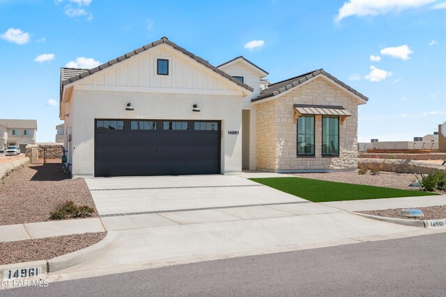 modern farmhouse with a garage