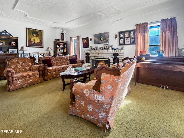 living room featuring a brick fireplace, a textured ceiling, and light colored carpet