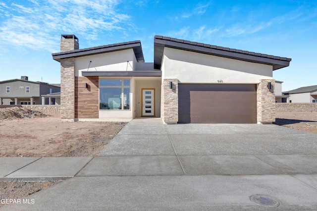 modern home featuring a garage