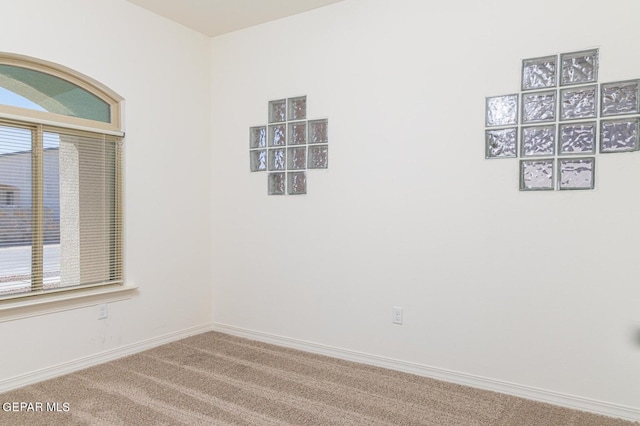 view of carpeted spare room