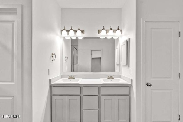 bathroom featuring double sink and oversized vanity