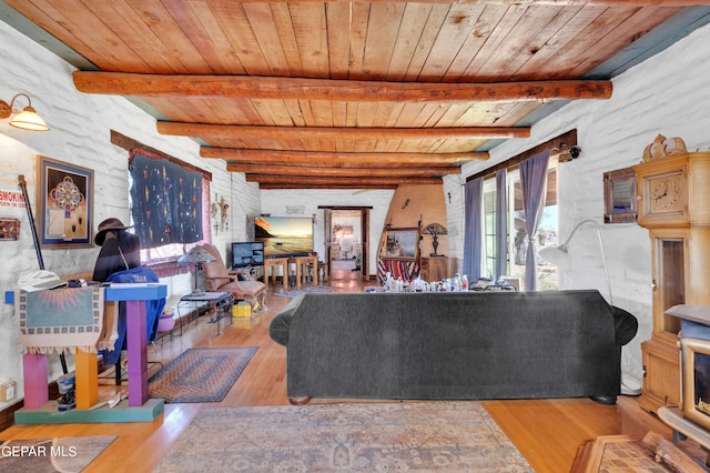 living room featuring wood ceiling, light hardwood / wood-style flooring, and beamed ceiling