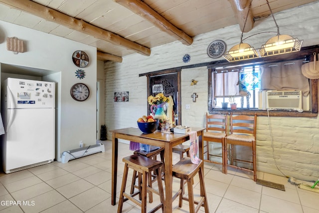 dining area featuring wood ceiling, light tile flooring, and beamed ceiling