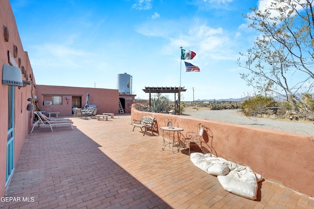 view of patio featuring a pergola