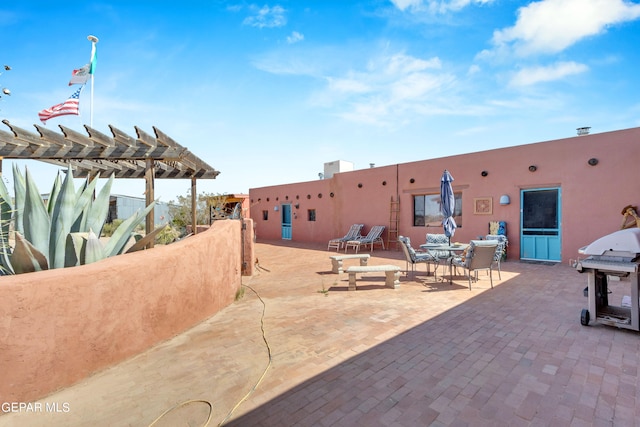 view of patio / terrace featuring a pergola