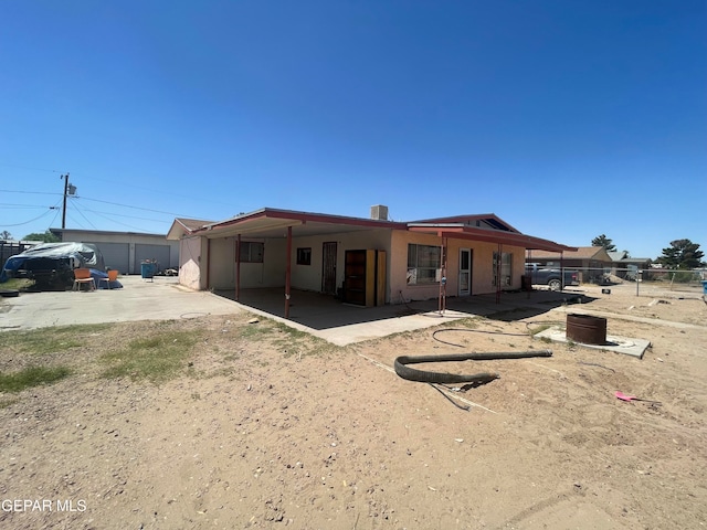 back of house featuring a patio