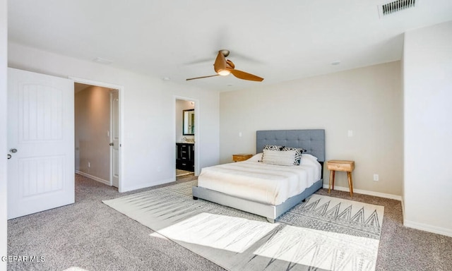 bedroom with ceiling fan and light carpet